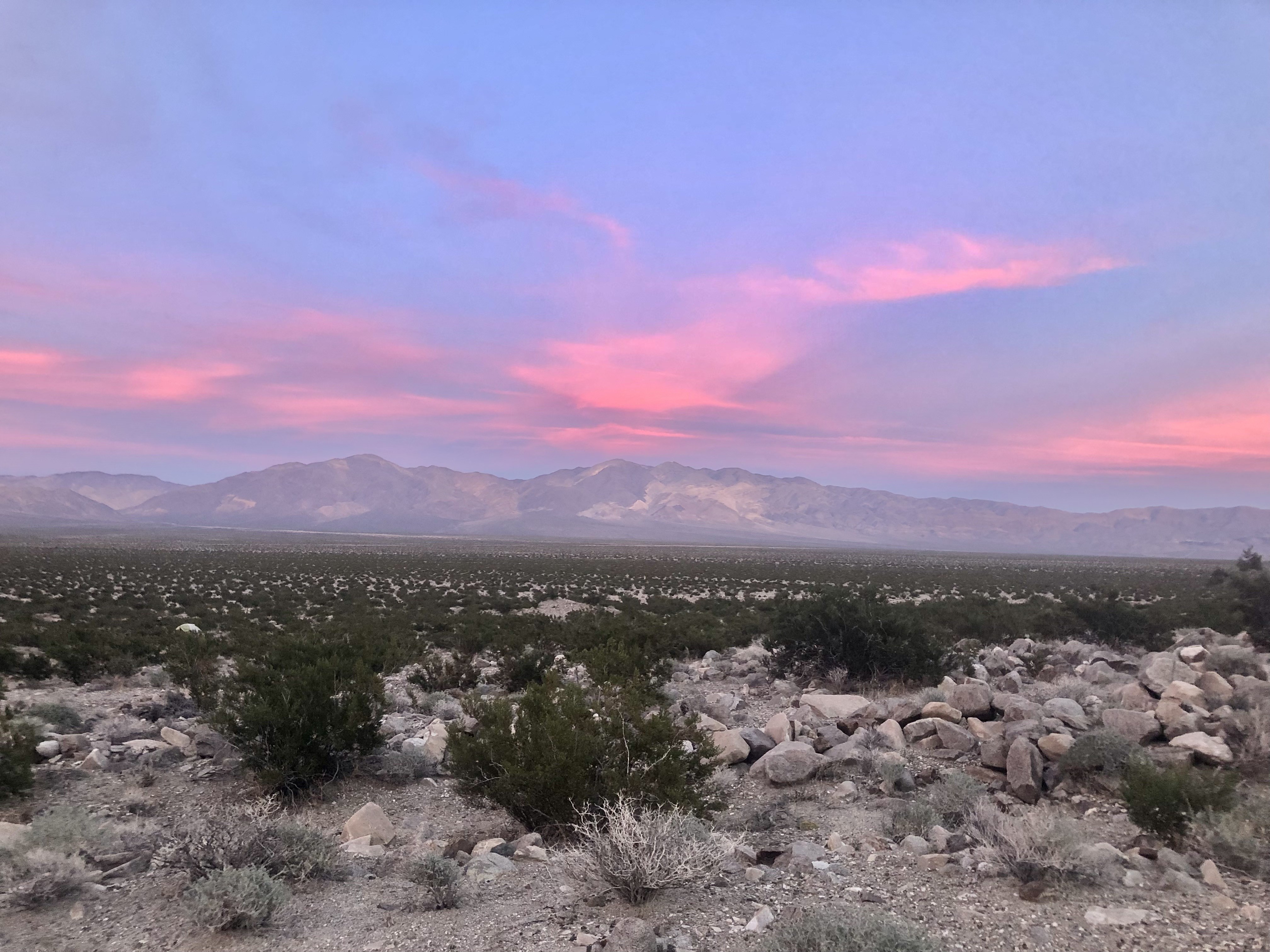 Distant mountains and a valley at sunset
